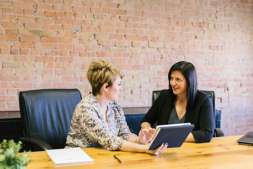 Professional strategy meeting representing law firm client acquisition consulting