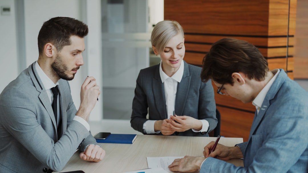 Lawyers meeting with a client in a modern office